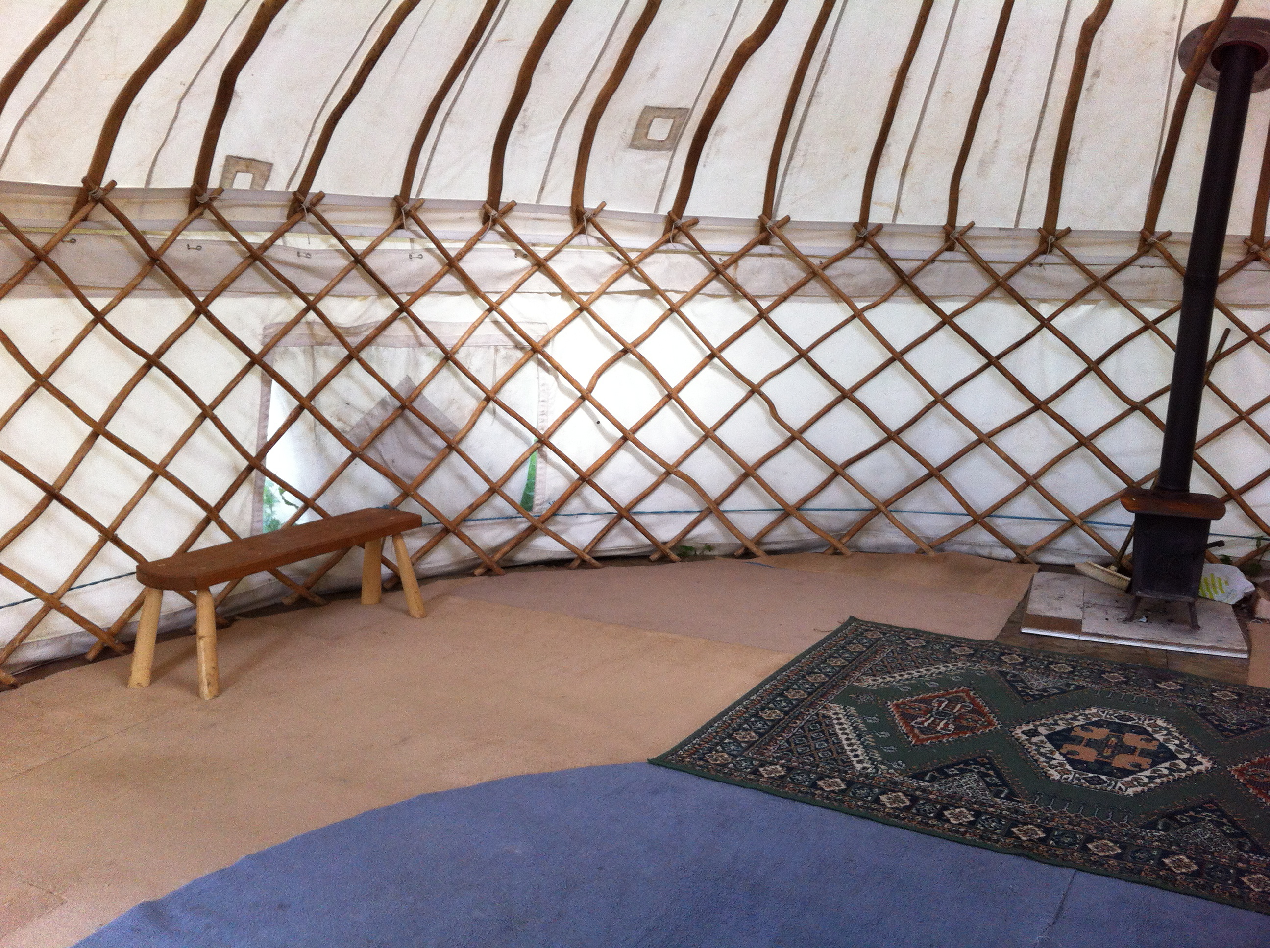 The cozy interior of our farm yurt